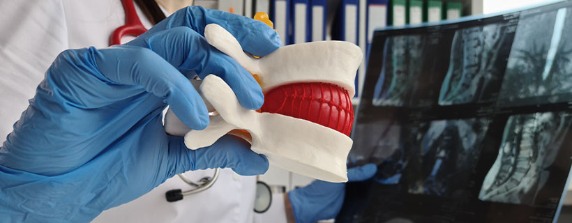 patient needing herniated disc chiropractor in Plano, Texas